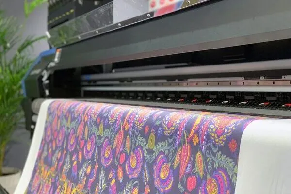 custom sublimation printing in process at habit fit sports factory in Sialkot Pakistan