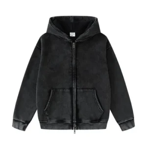 A dark charcoal grey hoodie with a vintage acid wash effect, featuring a full-length front zipper and kangaroo pockets.