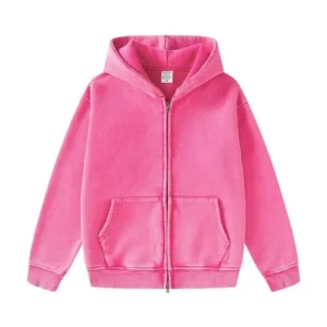 A bright pink hoodie with a subtle enzyme wash texture, a silver front zipper, and a relaxed athletic fit.