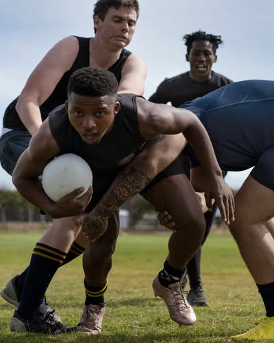 Men Playing Rugby