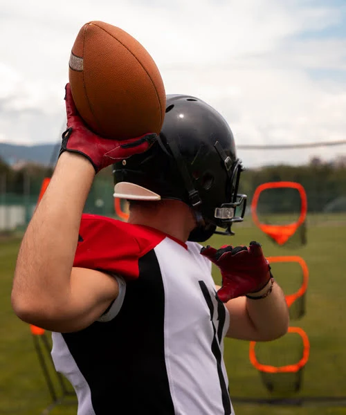 Men Wearing Custom Design American Football Uniform