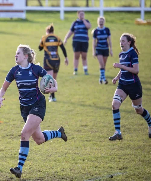 Women Rugby Team in Custom Made Rugby Clothes Playing Game